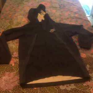 Nike waterproof windbreaker for mens or kids large